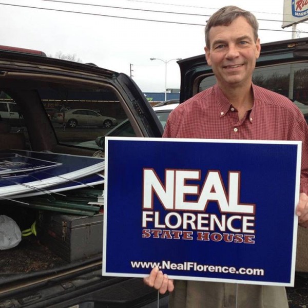 Neal Florence With Campaign Sign