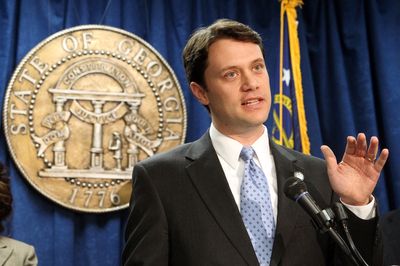 Jason Carter With State Seal