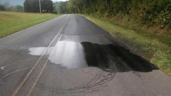 Ironman Oil in Road from Channel 9